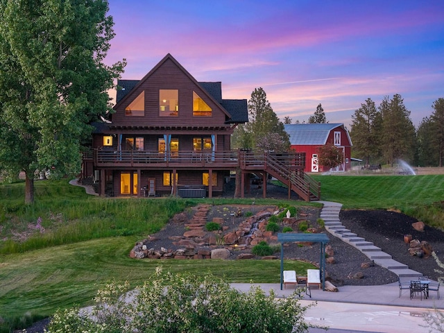 16010 W Jade Ln, Medical Lake, WA 99022 - back of property featuring stairs, a lawn, a barn, and a patio