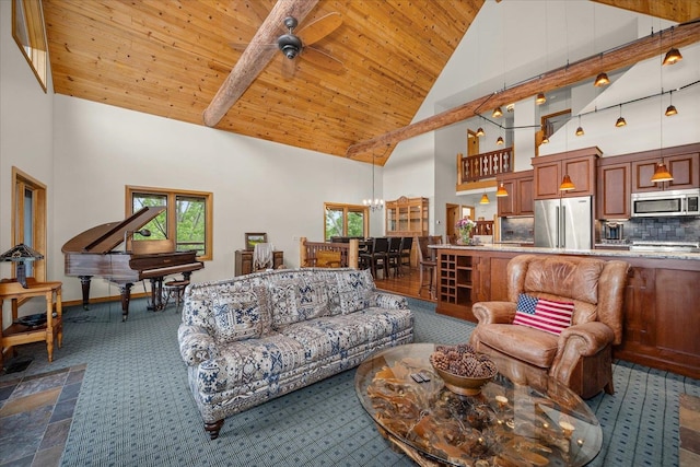 16010 W Jade Ln, Medical Lake, WA 99022 - carpeted living area with high vaulted ceiling, ceiling fan, wooden ceiling, and a chandelier