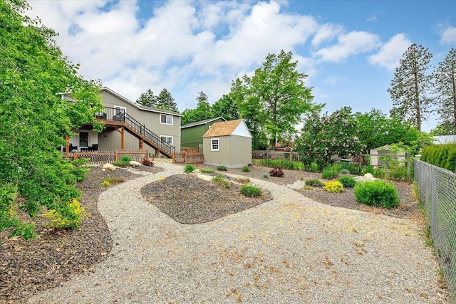 3815 E 19th Ave, Spokane, WA 99223 - fenced backyard featuring stairs and a wooden deck