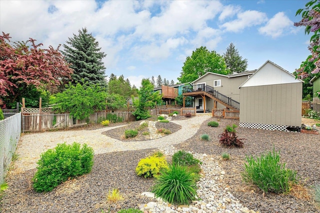 3815 E 19th Ave, Spokane, WA 99223 - fenced backyard with a deck and stairway