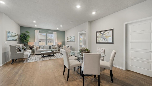 3705 S Keller Ln, Spokane Valley, WA 99206 - dining space featuring recessed lighting, wood finished floors, baseboards, and a textured ceiling