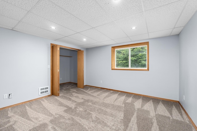 525 Quail Loop, Newport, WA 99156 - unfurnished bedroom with carpet, baseboards, a drop ceiling, a closet, and recessed lighting