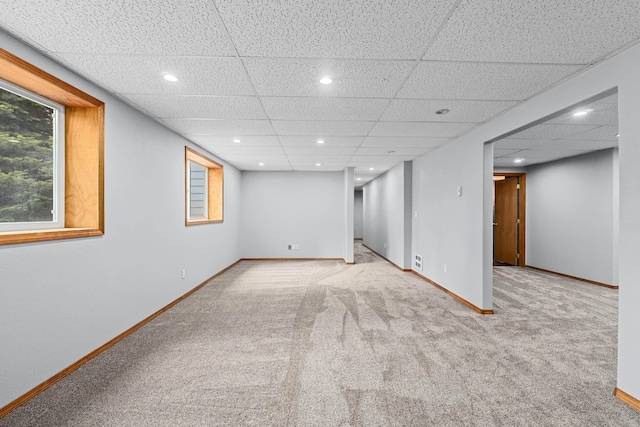 525 Quail Loop, Newport, WA 99156 - basement with carpet floors, a paneled ceiling, recessed lighting, and baseboards