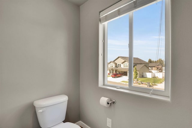 1105 S Oswald St, Spokane, WA 99224 - half bathroom with healthy amount of natural light, toilet, and baseboards