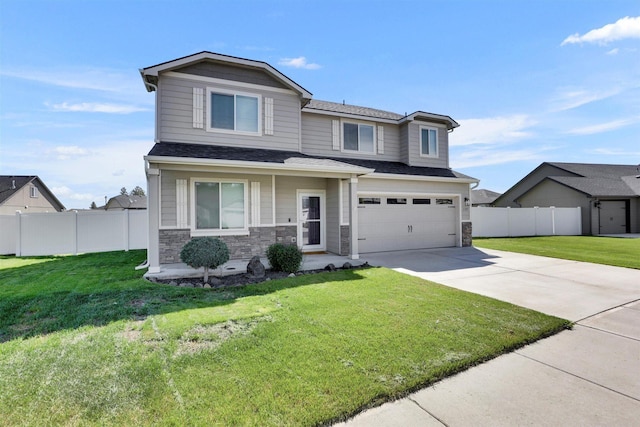 1105 S Oswald St, Spokane, WA 99224 - traditional-style house featuring concrete driveway, stone siding, a garage, and roof with shingles