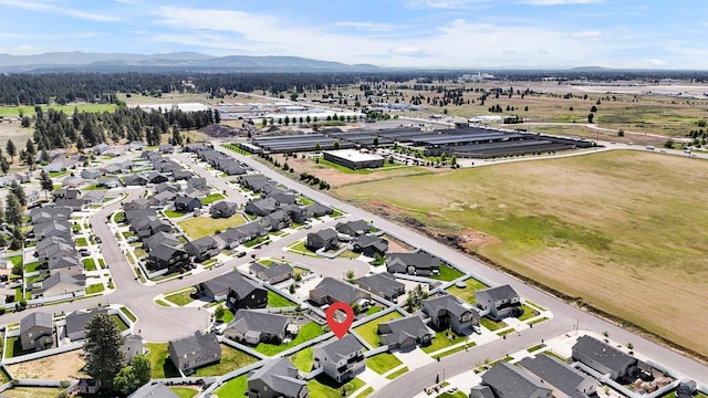 1105 S Oswald St, Spokane, WA 99224 - aerial perspective of suburban area with a mountain backdrop