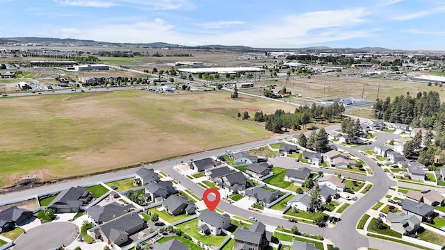 1105 S Oswald St, Spokane, WA 99224 - view of property location featuring nearby suburban area and a mountain backdrop