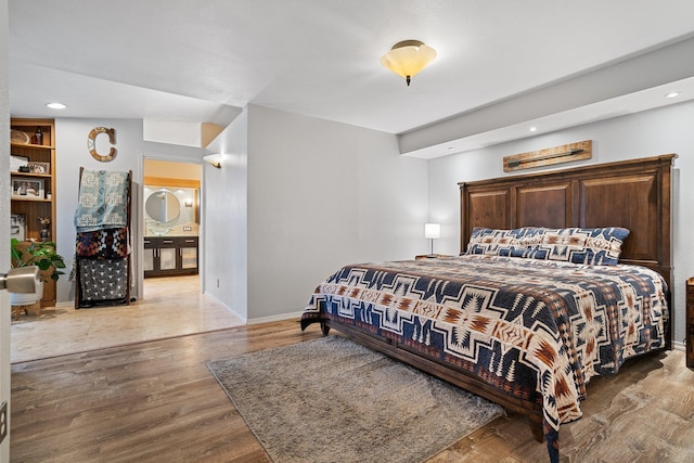 220 W Evergreen Dr, Kettle Falls, WA 99141 - bedroom featuring wood finished floors, recessed lighting, and baseboards