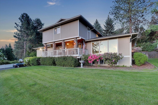 2205 S Conklin Rd, Spokane Valley, WA 99037 - view of front of property with a yard, stone siding, and stucco siding