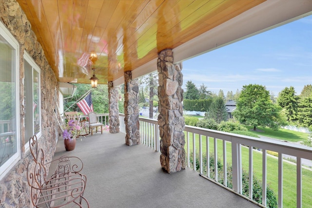 2205 S Conklin Rd, Spokane Valley, WA 99037 - porch with a lawn and a water view