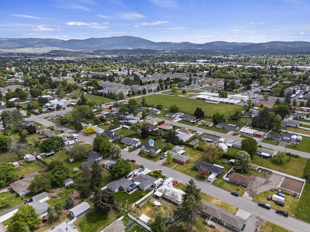 13304 E Desmet Ave, Spokane Valley, WA 99216 - aerial view of property's location featuring a mountain backdrop and nearby suburban area