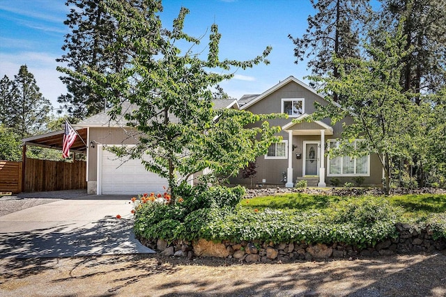 903 E 11th Ave, Spokane, WA 99202 - view of front of home featuring driveway, a garage, and stucco siding