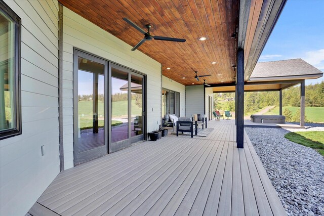 5110 W Hayden Ln, Spokane, WA 99208 - deck featuring ceiling fan and a covered hot tub