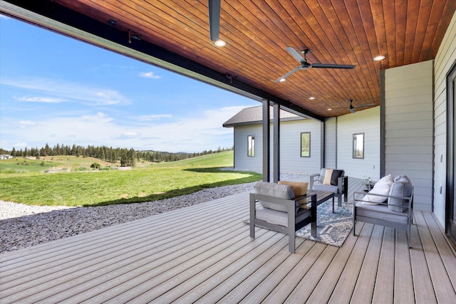 5110 W Hayden Ln, Spokane, WA 99208 - deck with an outdoor hangout area, a yard, and a ceiling fan