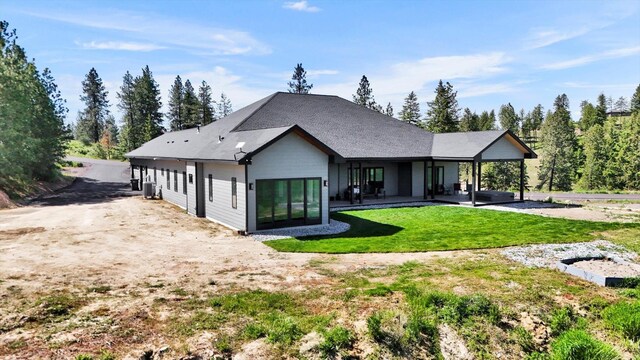 5110 W Hayden Ln, Spokane, WA 99208 - rear view of property featuring a lawn and a patio