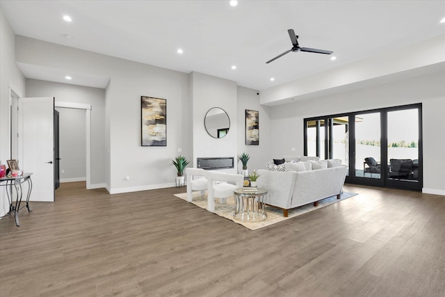 5110 W Hayden Ln, Spokane, WA 99208 - living room featuring recessed lighting, a ceiling fan, baseboards, and wood finished floors