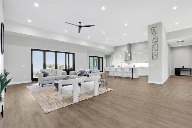 5110 W Hayden Ln, Spokane, WA 99208 - living area featuring ceiling fan, wood finished floors, recessed lighting, and baseboards