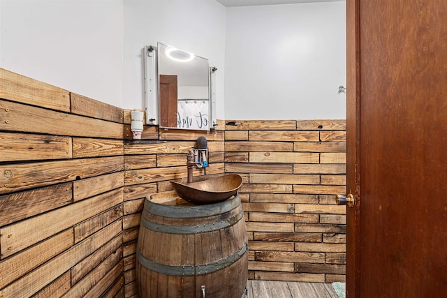 705 Old Kettle Rd, Kettle Falls, WA 99114 - bathroom featuring wood finished floors and a sink