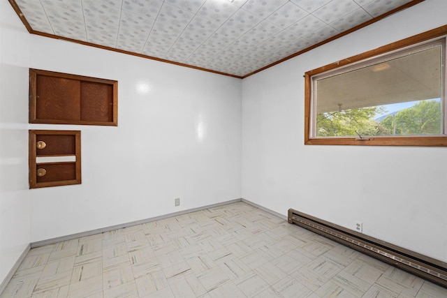 705 Old Kettle Rd, Kettle Falls, WA 99114 - empty room featuring ornamental molding, a baseboard heating unit, and baseboards