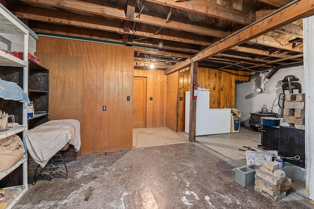 705 Old Kettle Rd, Kettle Falls, WA 99114 - unfinished below grade area featuring refrigerator, gas water heater, and washer / dryer