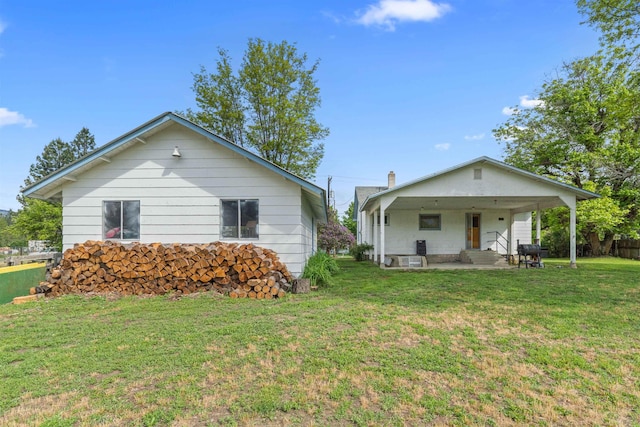 705 Old Kettle Rd, Kettle Falls, WA 99114 - view of front of home with a front yard and a patio