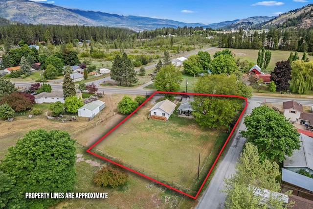 705 Old Kettle Rd, Kettle Falls, WA 99114 - aerial view of property's location featuring property parcel outlined and a mountainous background
