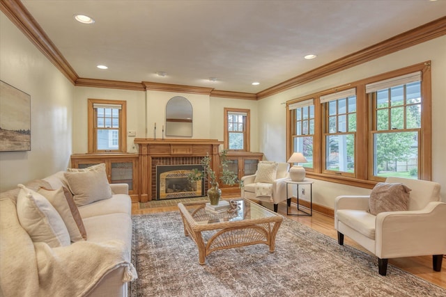 112 E 22nd Ave, Spokane, WA 99203 - living room with healthy amount of natural light, wood finished floors, crown molding, a fireplace, and baseboards