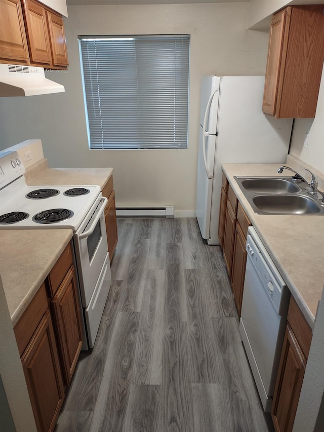 108 E Weile Ave # 1, Spokane, WA 99208 - kitchen with a sink, white appliances, under cabinet range hood, a baseboard radiator, and dark wood-style floors
