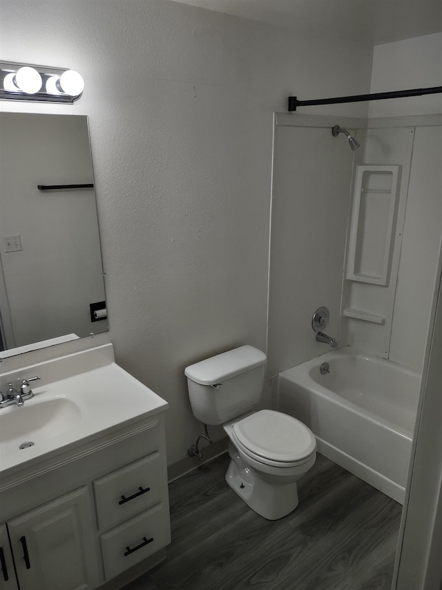 108 E Weile Ave # 1, Spokane, WA 99208 - full bath featuring toilet, vanity, wood finished floors, and bathtub / shower combination