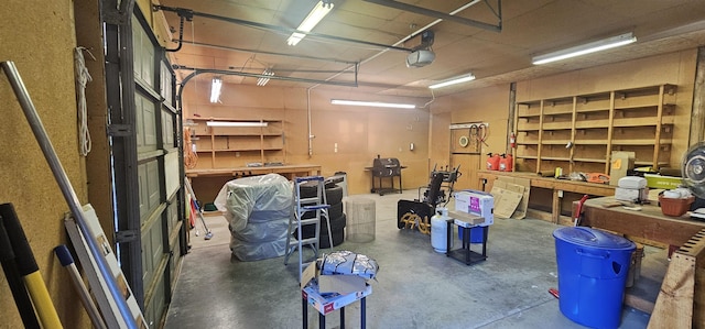 2267 Hawks Rd, Colville, WA 99114 - garage with a workshop area and a garage door opener
