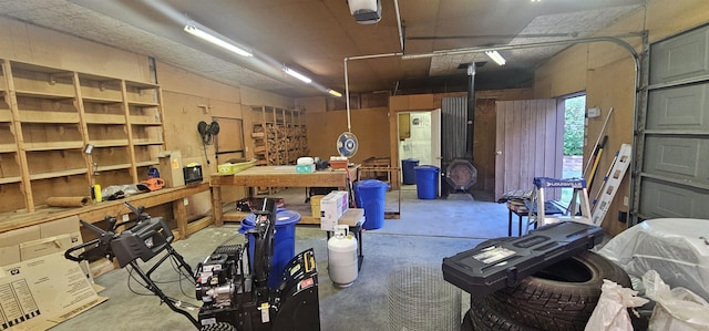 2267 Hawks Rd, Colville, WA 99114 - garage featuring a workshop area and a garage door opener