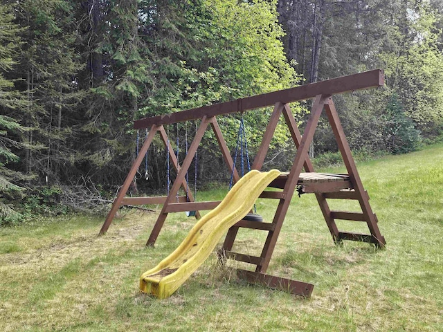 2267 Hawks Rd, Colville, WA 99114 - view of playground with a lawn and a wooded view
