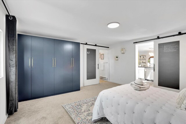 7311 E Fairview Ave, Spokane Valley, WA 99212 - bedroom featuring a barn door and a baseboard radiator