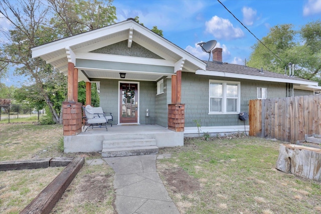 7311 E Fairview Ave, Spokane Valley, WA 99212 - view of front of home featuring covered porch and a chimney
