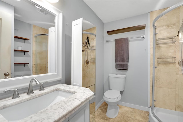 7311 E Fairview Ave, Spokane Valley, WA 99212 - bathroom featuring vanity, a shower stall, toilet, and baseboards