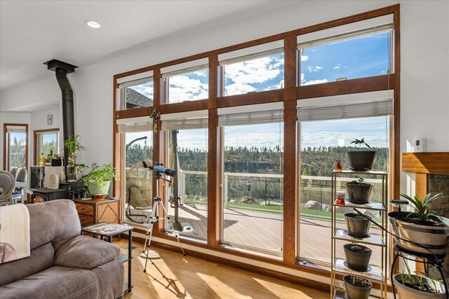 16503 W Bluebird Ln, Spokane, WA 99224 - doorway with light wood finished floors, plenty of natural light, and recessed lighting