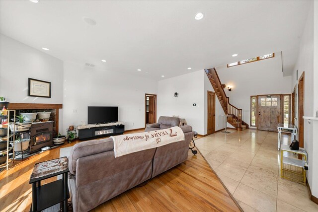 16503 W Bluebird Ln, Spokane, WA 99224 - living room with stairway, recessed lighting, and a wood stove