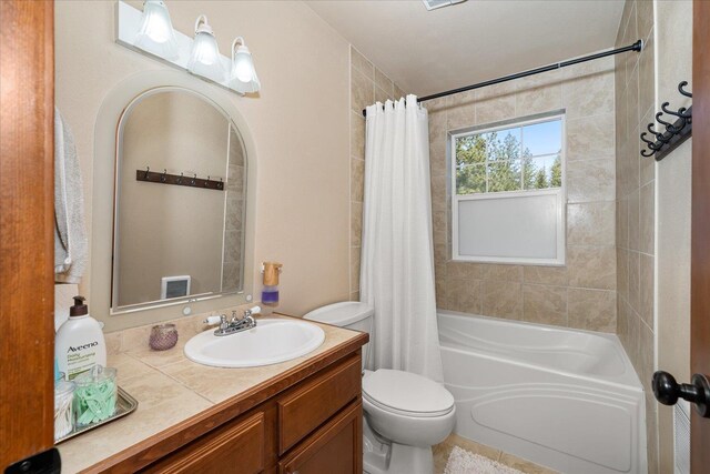 16503 W Bluebird Ln, Spokane, WA 99224 - bathroom featuring vanity, shower / bathtub combination with curtain, and toilet