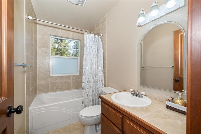 16503 W Bluebird Ln, Spokane, WA 99224 - full bathroom featuring vanity, shower / bath combination with curtain, toilet, and tile patterned flooring