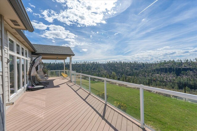 16503 W Bluebird Ln, Spokane, WA 99224 - wooden terrace with a lawn