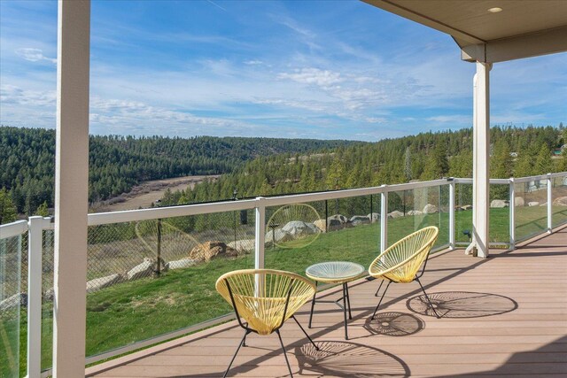 16503 W Bluebird Ln, Spokane, WA 99224 - wooden deck with a view of trees