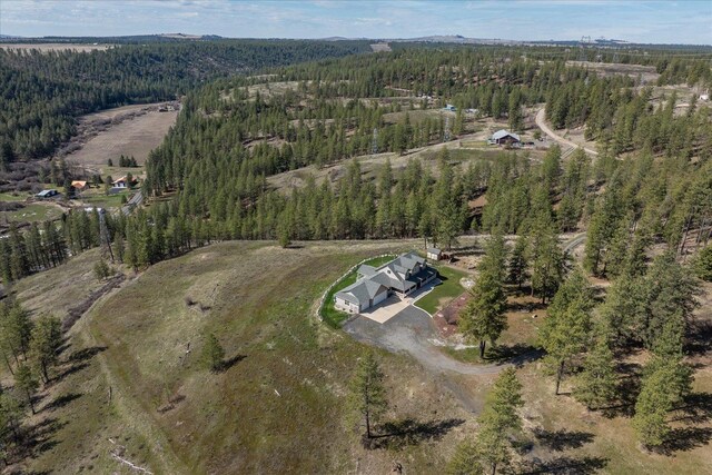 16503 W Bluebird Ln, Spokane, WA 99224 - aerial overview of property's location featuring a heavily wooded area