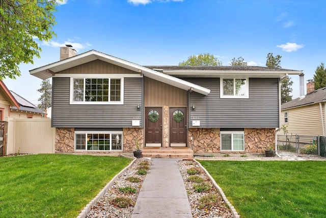 423 W Providence Ave, Spokane, WA 99205 - bi-level home featuring stone siding and a chimney