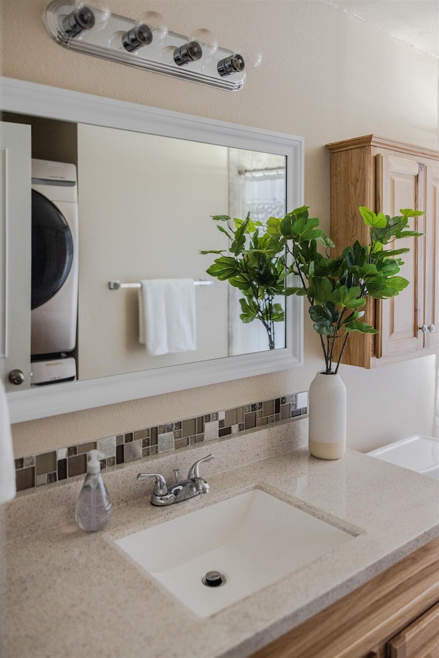423 W Providence Ave, Spokane, WA 99205 - bathroom featuring washer / dryer and vanity