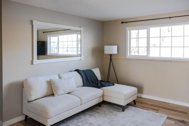 423 W Providence Ave, Spokane, WA 99205 - sitting room featuring plenty of natural light, wood finished floors, and baseboards