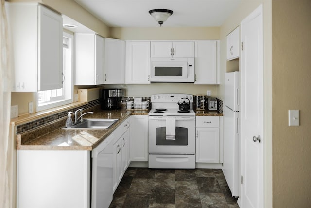 423 W Providence Ave, Spokane, WA 99205 - kitchen featuring white appliances, a sink, and white cabinetry