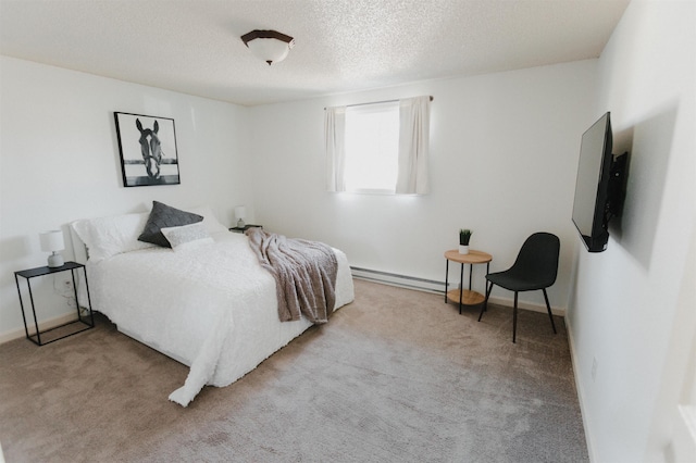 423 W Providence Ave, Spokane, WA 99205 - carpeted bedroom with a baseboard radiator, a textured ceiling, and baseboards