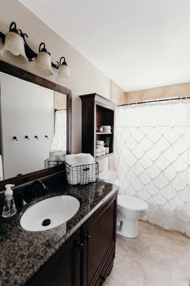 423 W Providence Ave, Spokane, WA 99205 - full bath with vanity, toilet, and curtained shower
