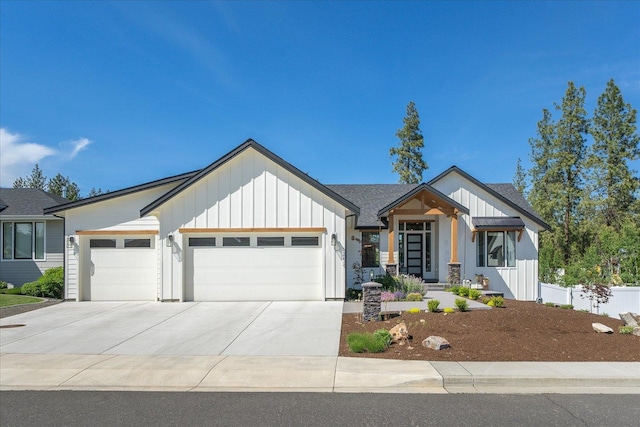5212 W Decatur Ave, Spokane, WA 99208 - modern farmhouse style home with board and batten siding, an attached garage, and concrete driveway