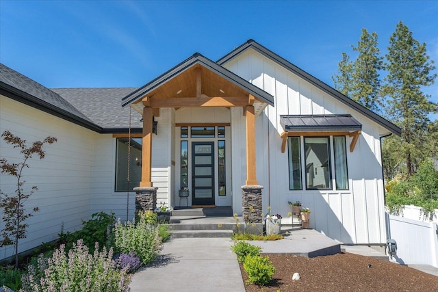 5212 W Decatur Ave, Spokane, WA 99208 - view of exterior entry featuring board and batten siding and a shingled roof